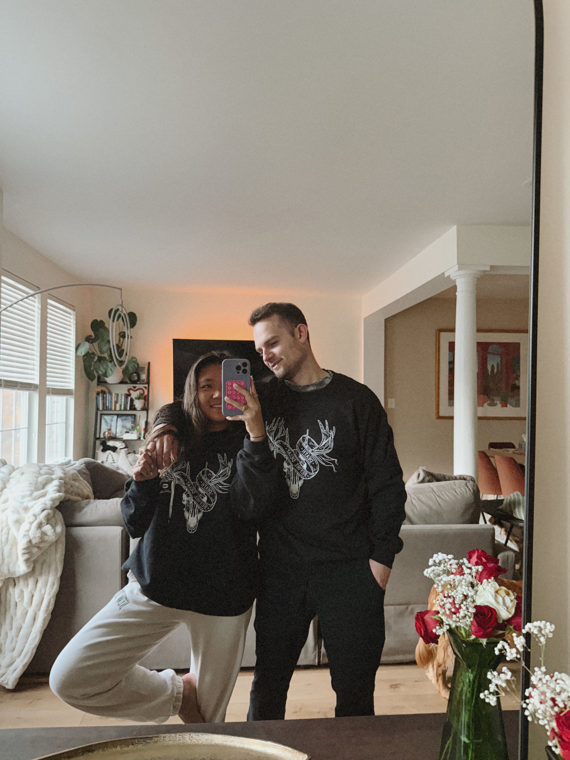 Rachel (left) is wearing a XL; Josh (right) is wearing a L.